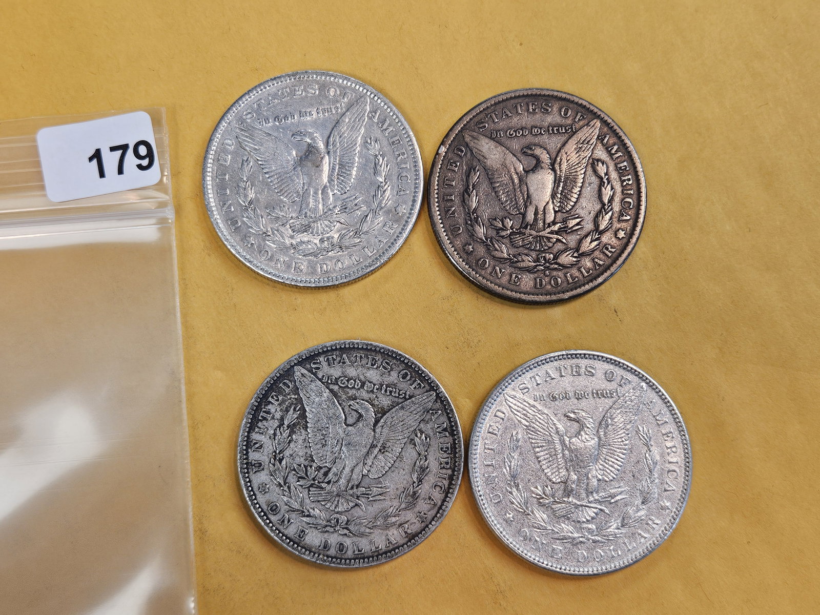 Four mixed Morgan silver Dollars - 2