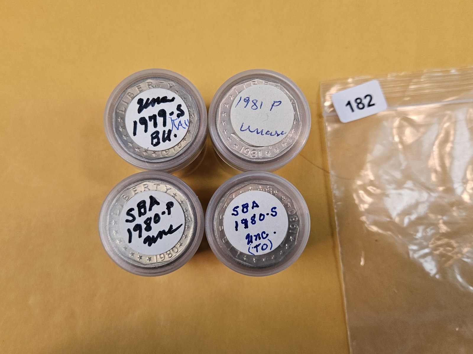 Four mixed, Brilliant Uncirculated Rolls of Susan B Anthony Dollars: From an old collection. We didn't open or check