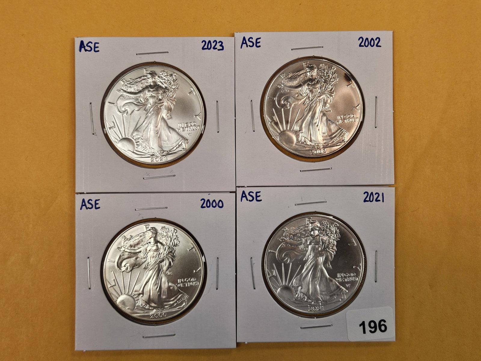 Four GEM Brilliant Uncirculated American Silver Eagles: Mixed.