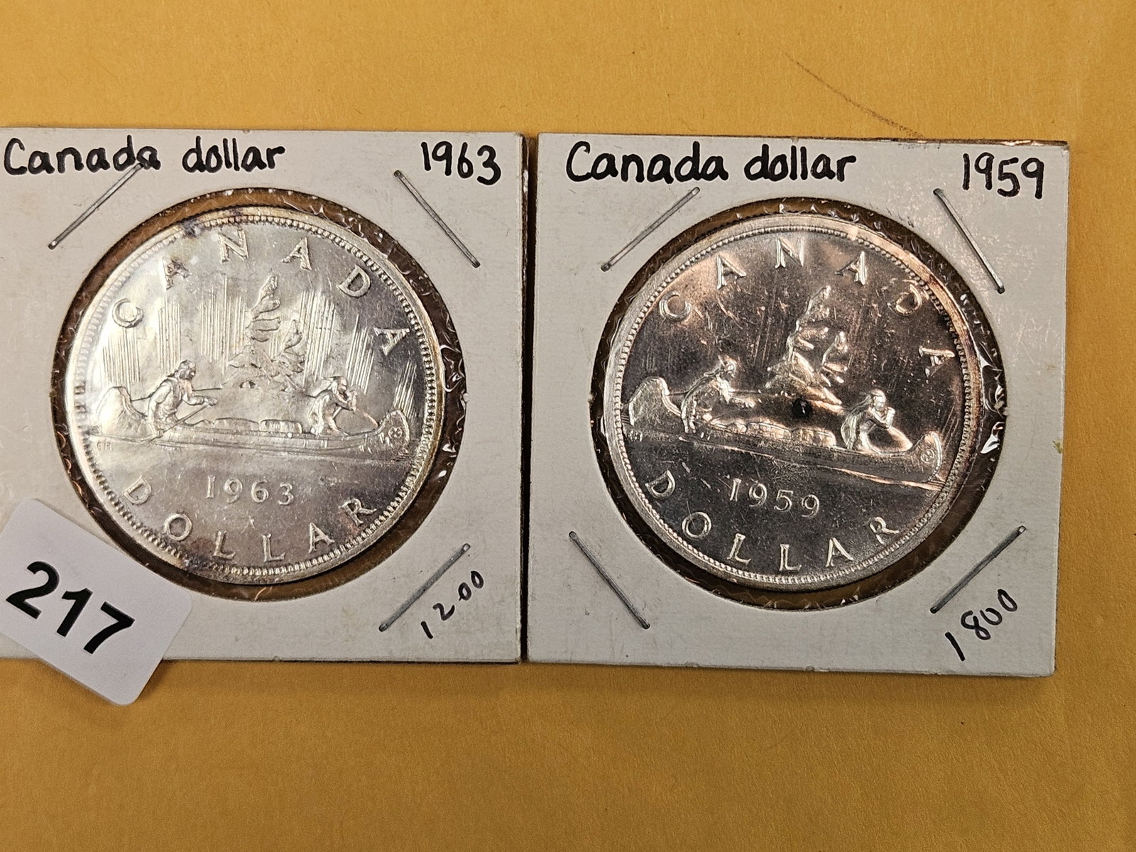 Two Canadian Silver Dollars: 1963 and 1959