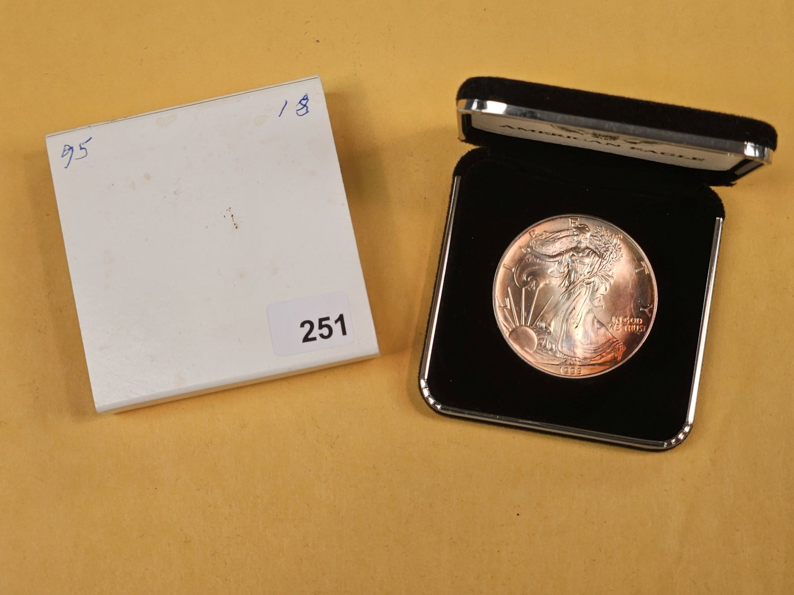 GEM Brilliant Uncirculated 1995 American Silver Eagle: In OGP but no COA. Toned