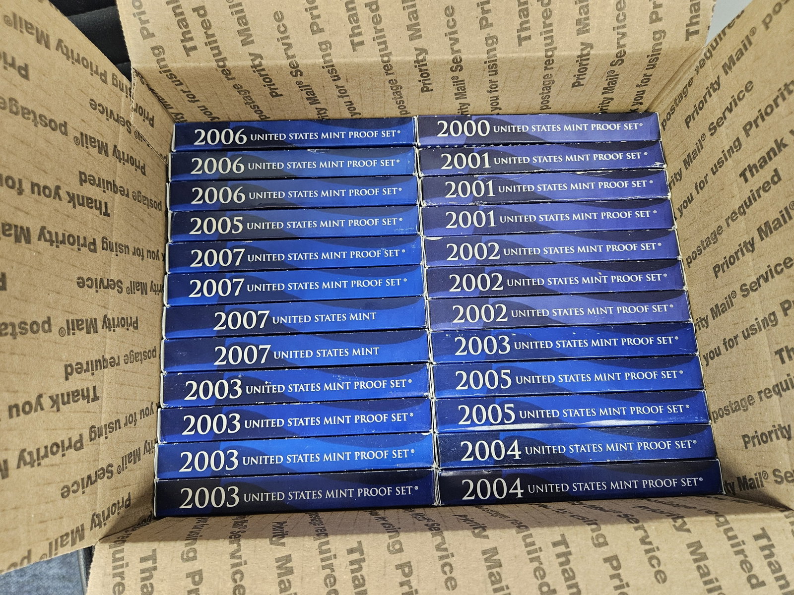 TWENTY-FOUR US PROOF SETS!: Ships separately in a Flat Rate Medium Box. Duplicates. No combined shipping