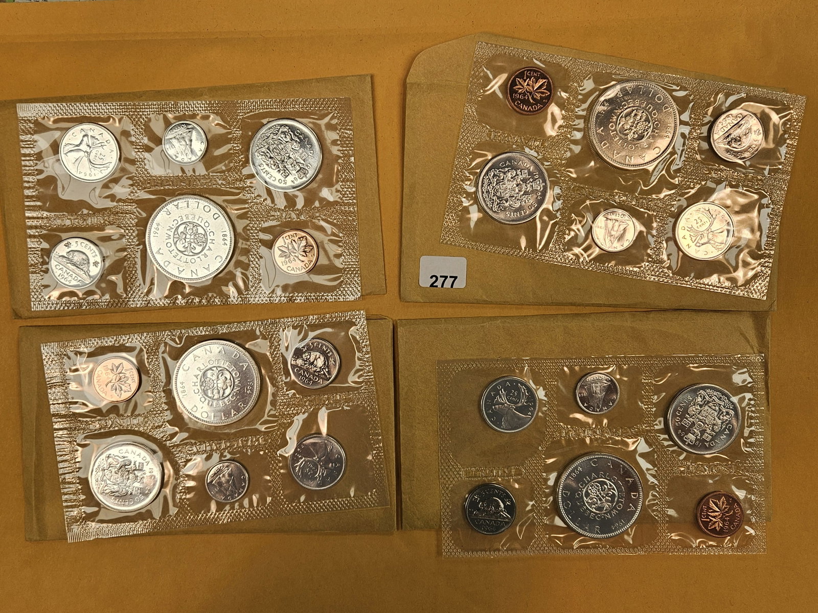 Four 1964 GEM Prooflike Canada Silver Uncirculated coin sets: In OGP