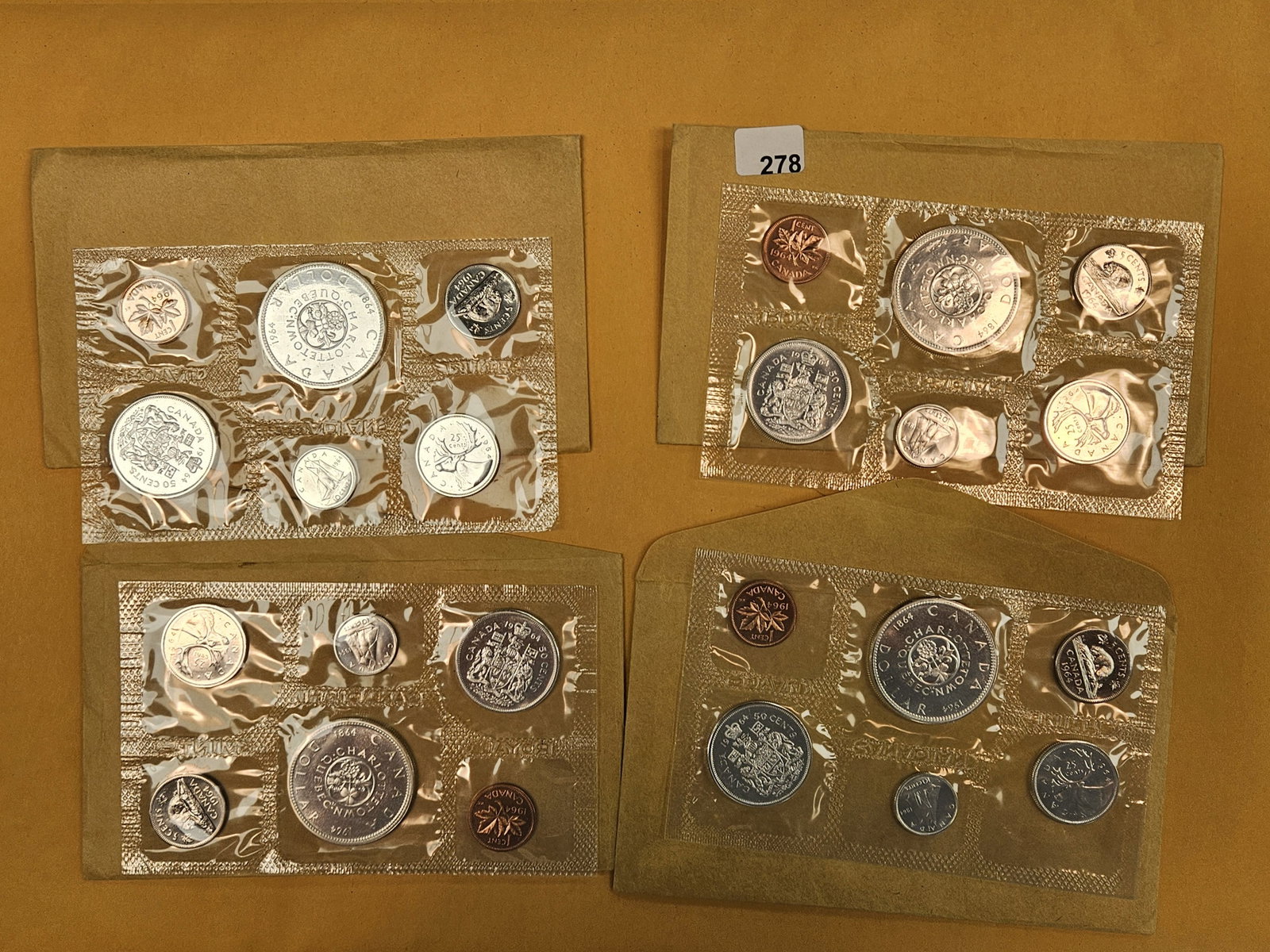 Four 1964 GEM Prooflike Canada Silver Uncirculated coin sets: In OGP