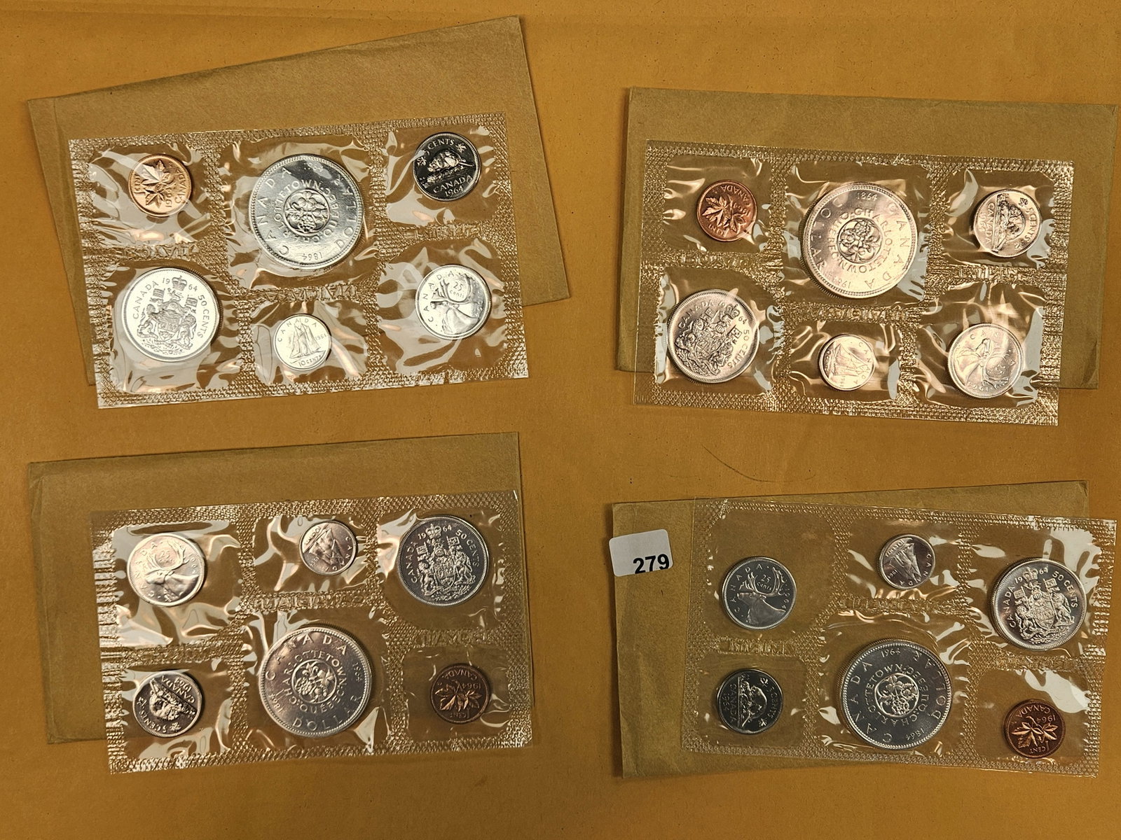 Four 1964 GEM Prooflike Canada Silver Uncirculated coin sets: In OGP