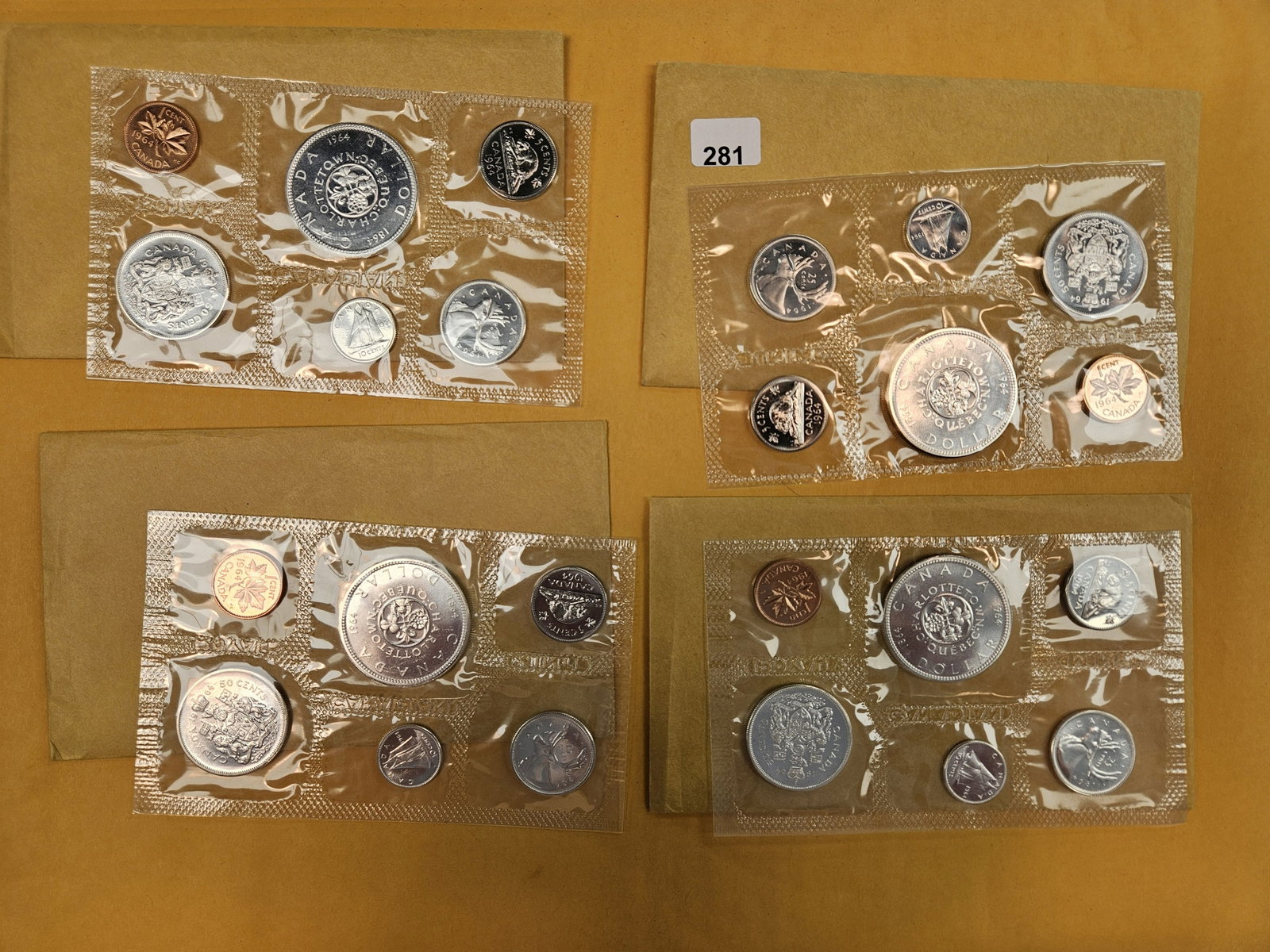 Four 1964 GEM Prooflike Canada Silver Uncirculated coin sets: In OGP