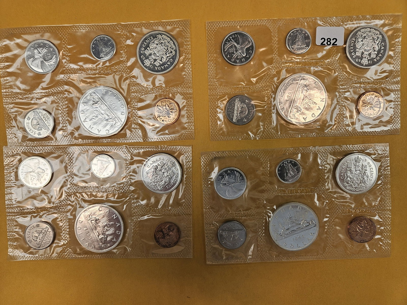 Four 1963 GEM Prooflike Canada Silver Uncirculated coin sets: In blister packs