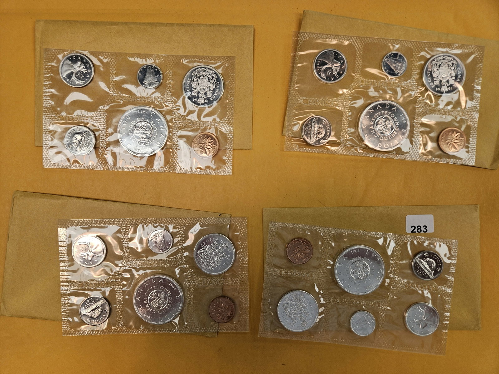 Four 1964 GEM Prooflike Canada Silver Uncirculated coin sets: In OGP
