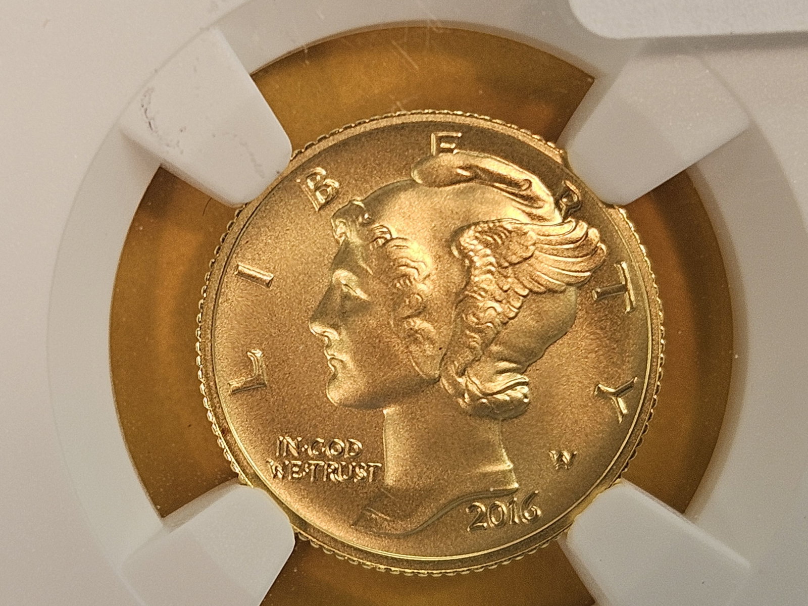 GOLD! GEM NGC 2016-W GOLD Mercury Dime in Specimen 69: Gorgeous 100th Anniversary Gold Mercury Dime. Purt near Perfect! West Point Mint. Made from Pure 24 Karat Gold!