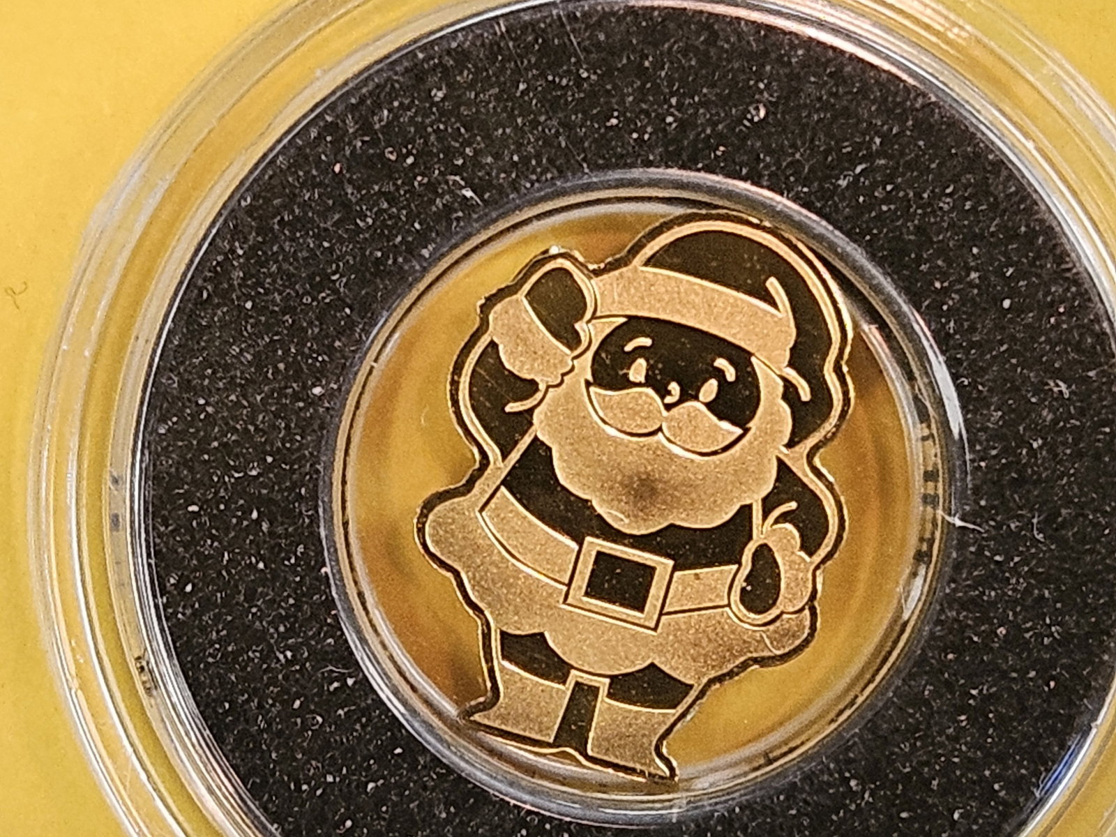 GOLD! GEM Republic of Palau Gold Dollar: GEM Proof Santa on the obverse