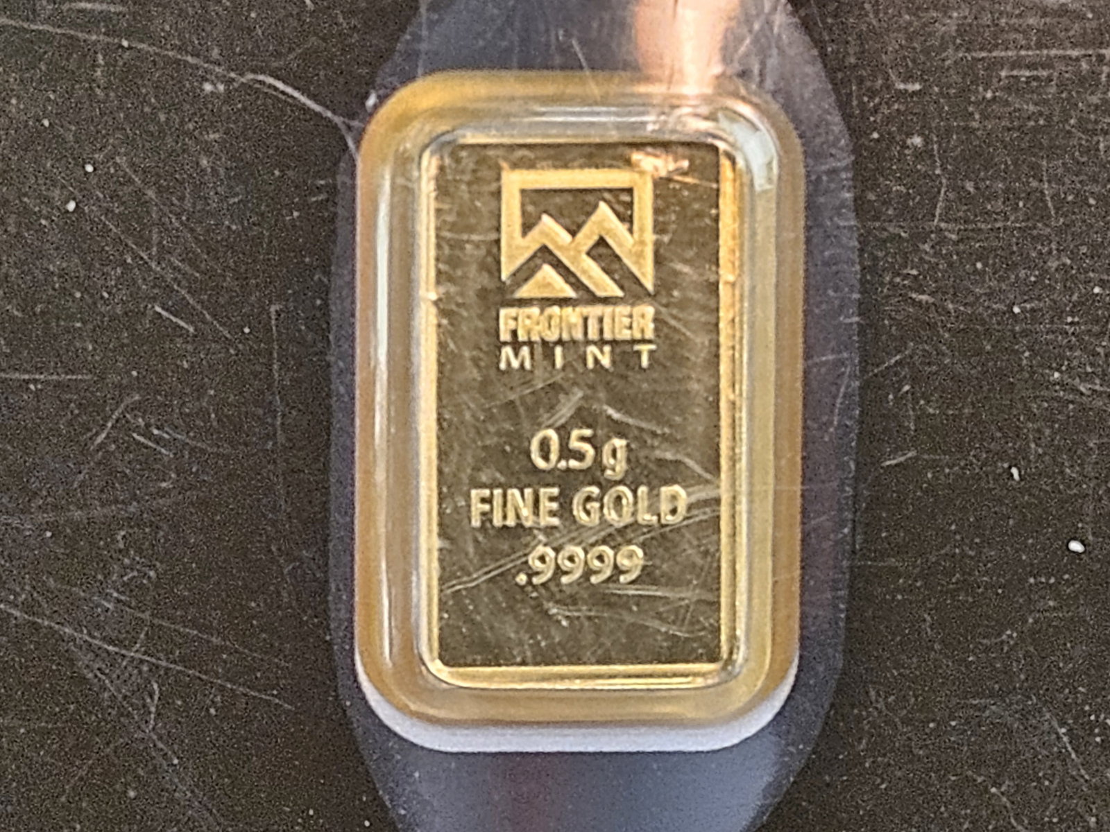 GOLD! Frontier Mint One-half Gram .9999 fine gold bar: In original assay holder