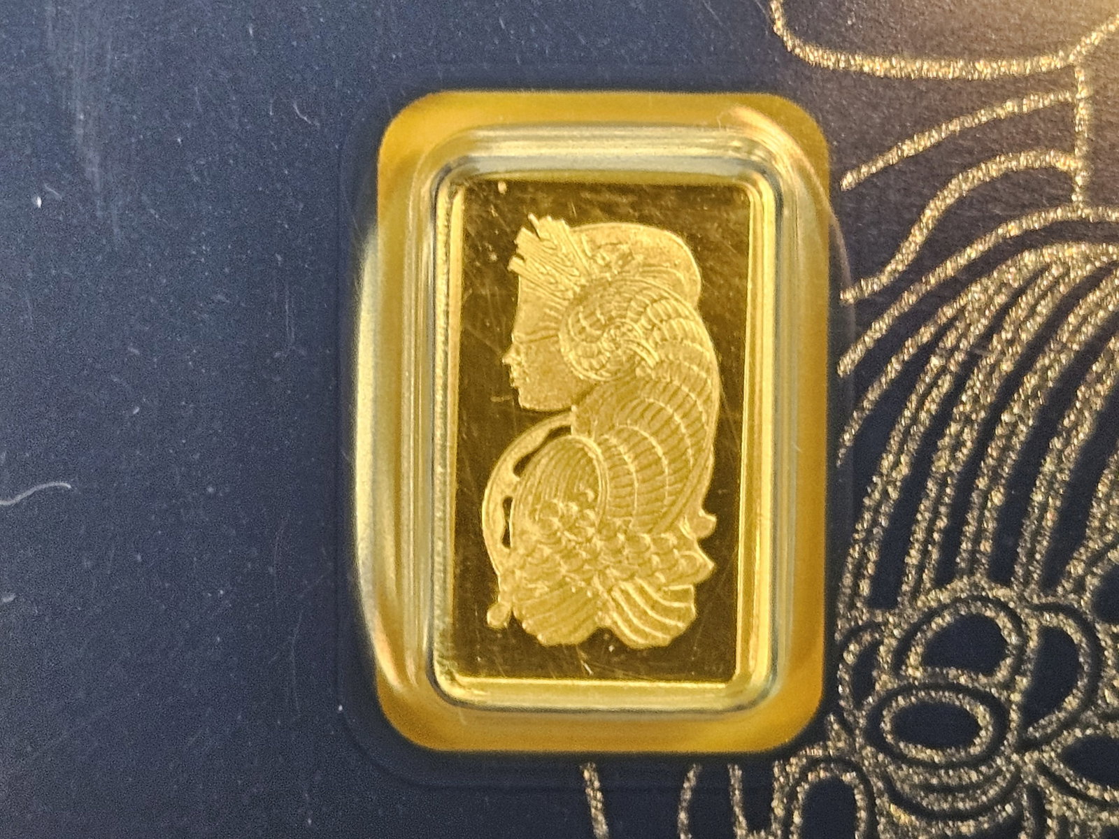 GOLD! PAMP Suisse Gold One gram .9999 fine gold bar: In original assay holder