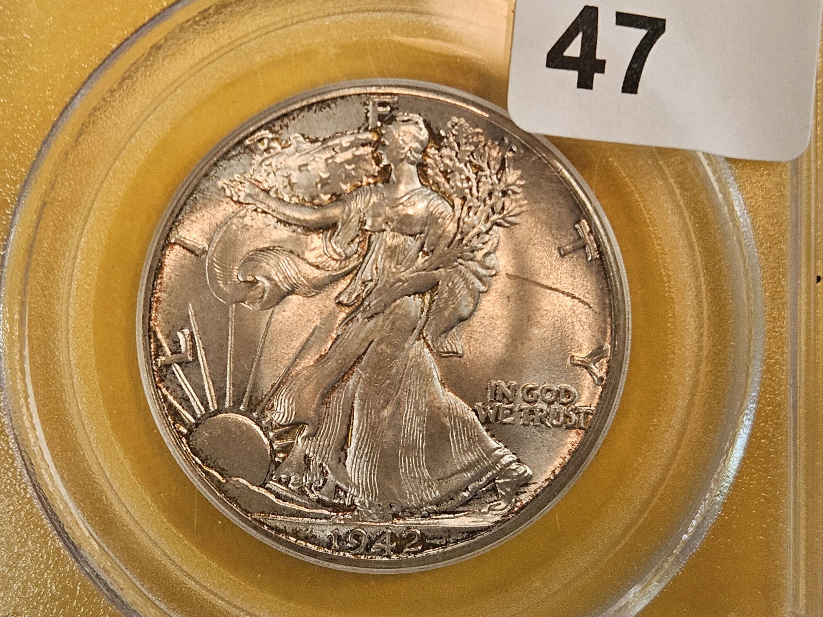 PCGS! OGH! 1942 Walking Liberty Half Dollar in Mint State 62: Old Green Holder! Little toning