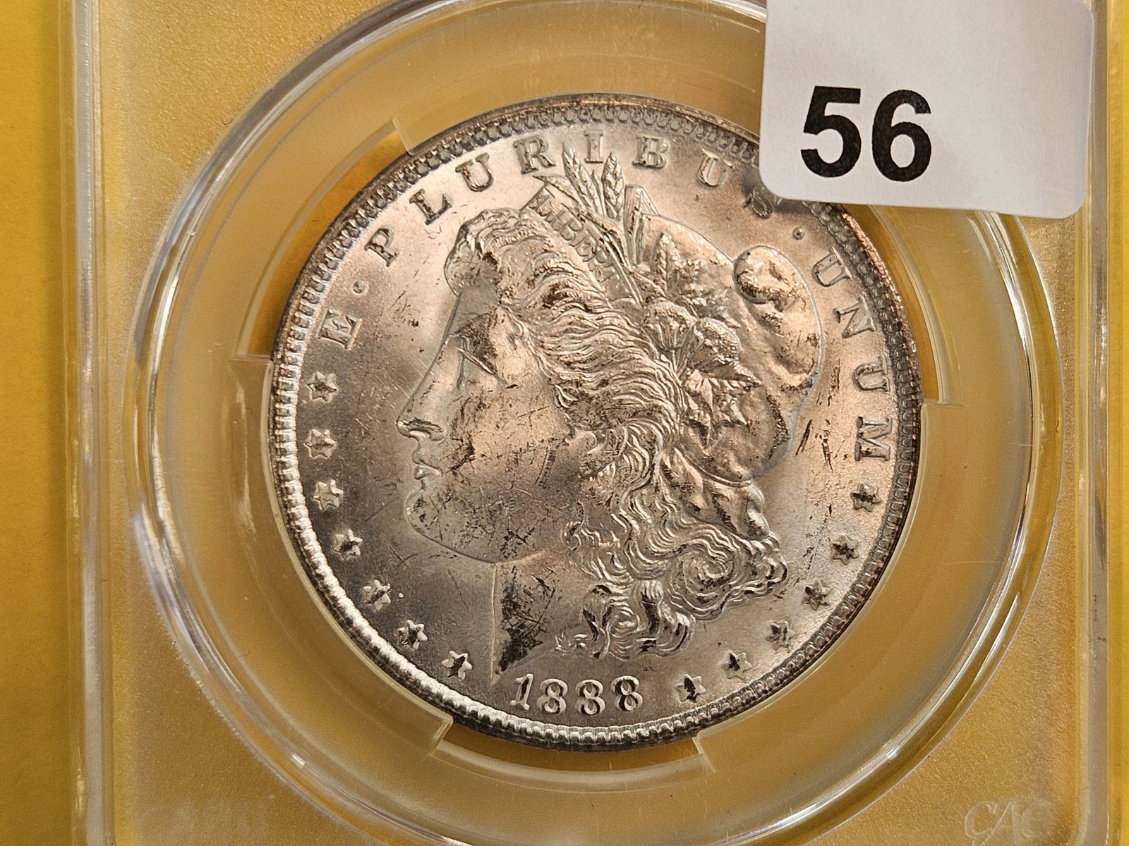 CACG 1888 Morgan Dollar in Mint State 63: Frosty