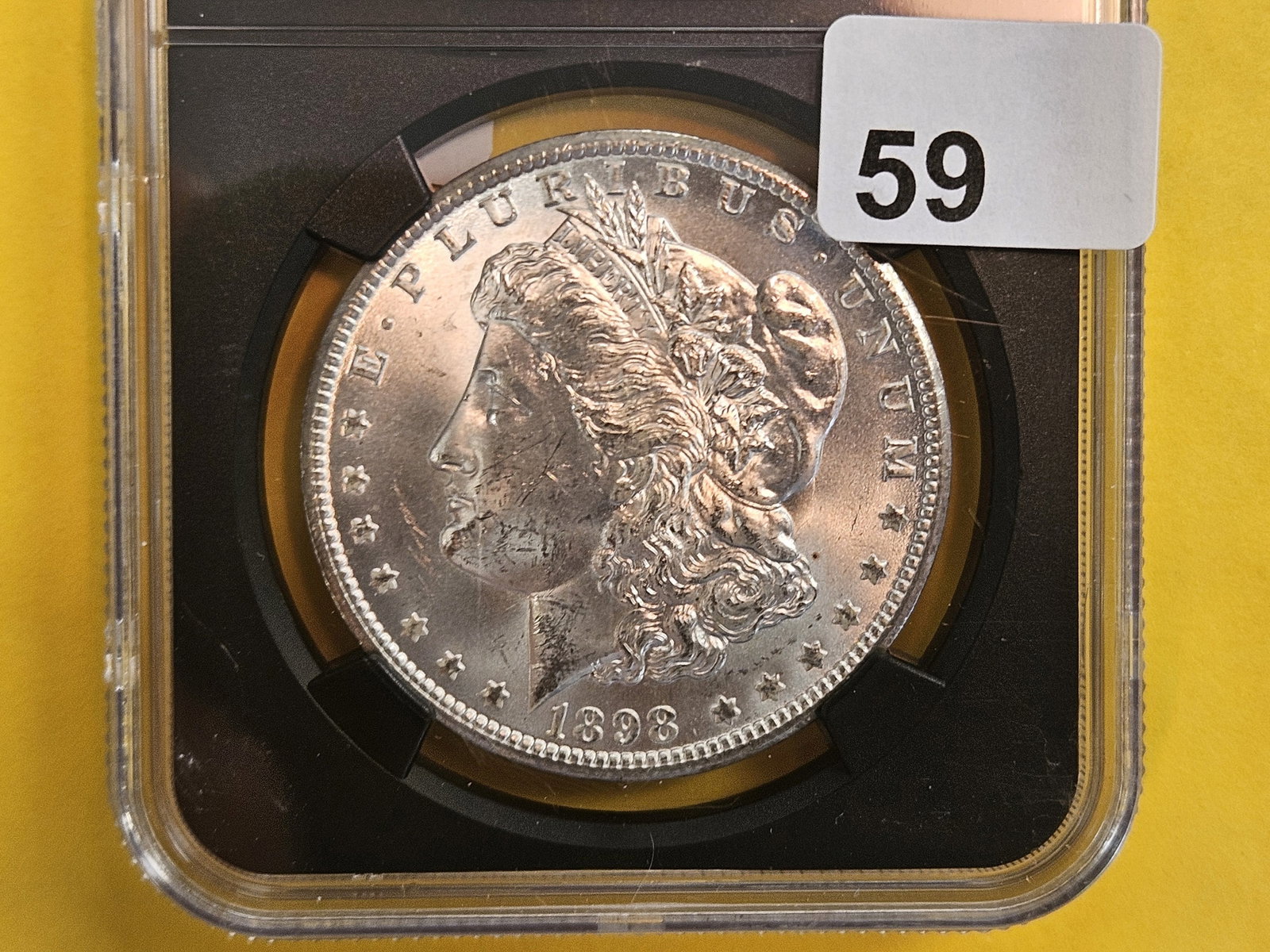 NGC 1898-O Morgan Dollar in Mint State 63 (1 of 3)