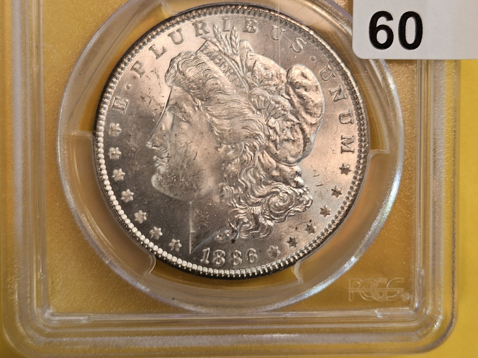 PCGS 1886 Morgan Dollar in Mint State 63: Lovely satiny luster