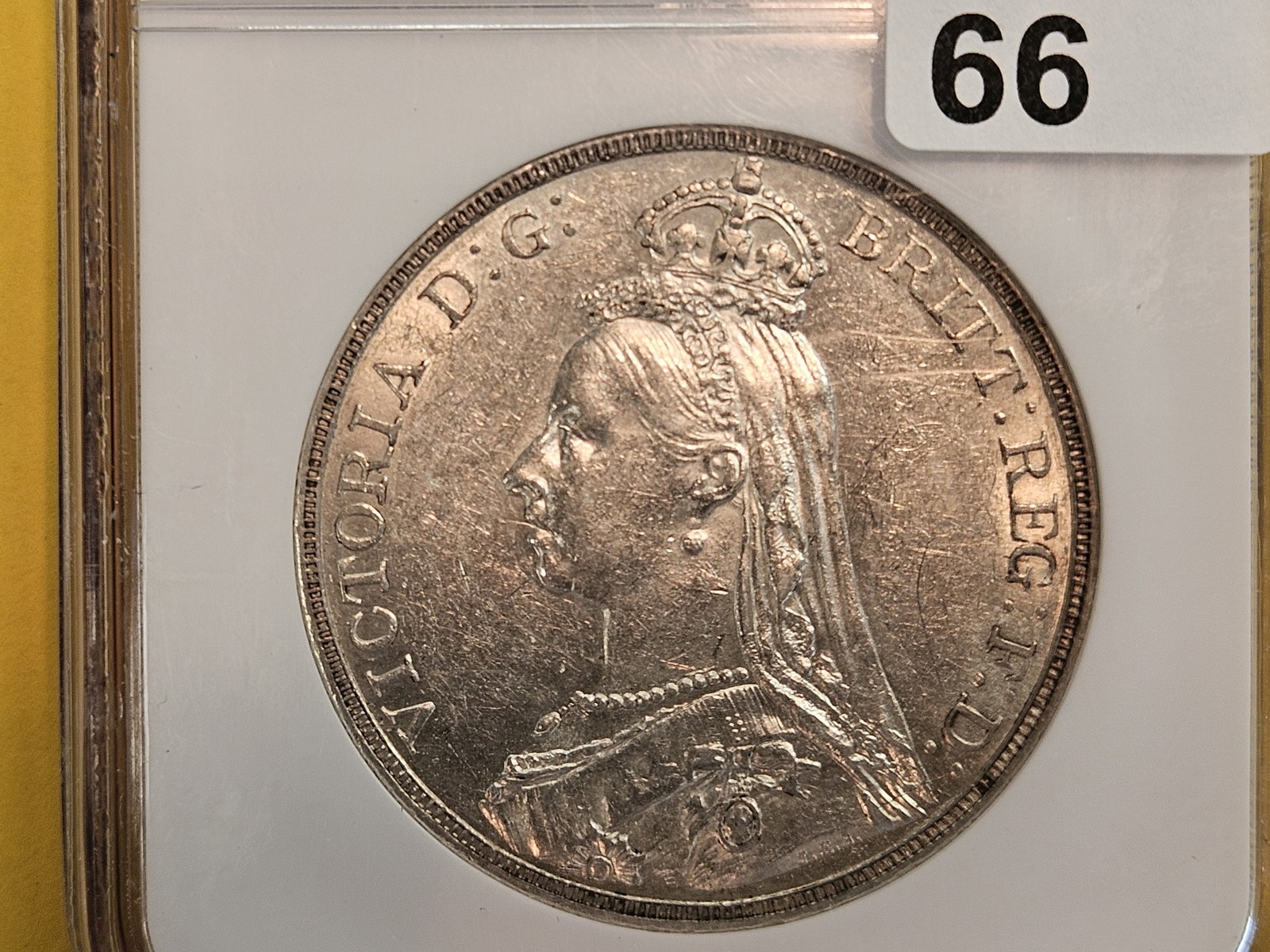 NGC 1891 Great Britain silver Crown in Brilliant About Uncirculated - 58: Honestly it's uncirculated. Someone saw maybe a smidgeon of friction called it an AU-58. Still has great original luster!