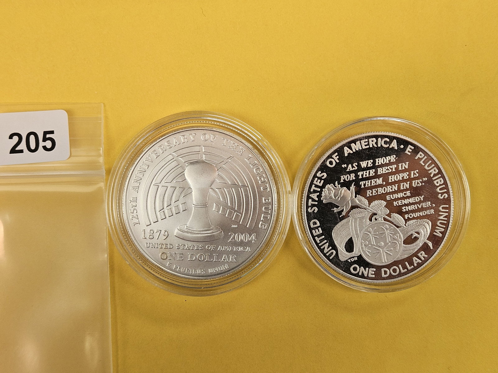 Two GEM Commemorative Silver Dollars: Proof and BU. Both in original capsules