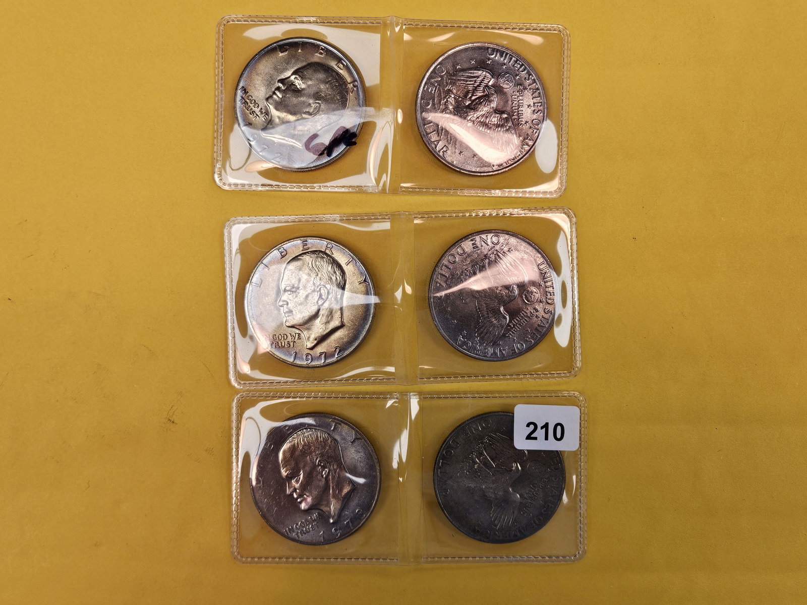 Six GEM Brilliant Uncirculated TONED Eisenhower Dollars (1 of 5)