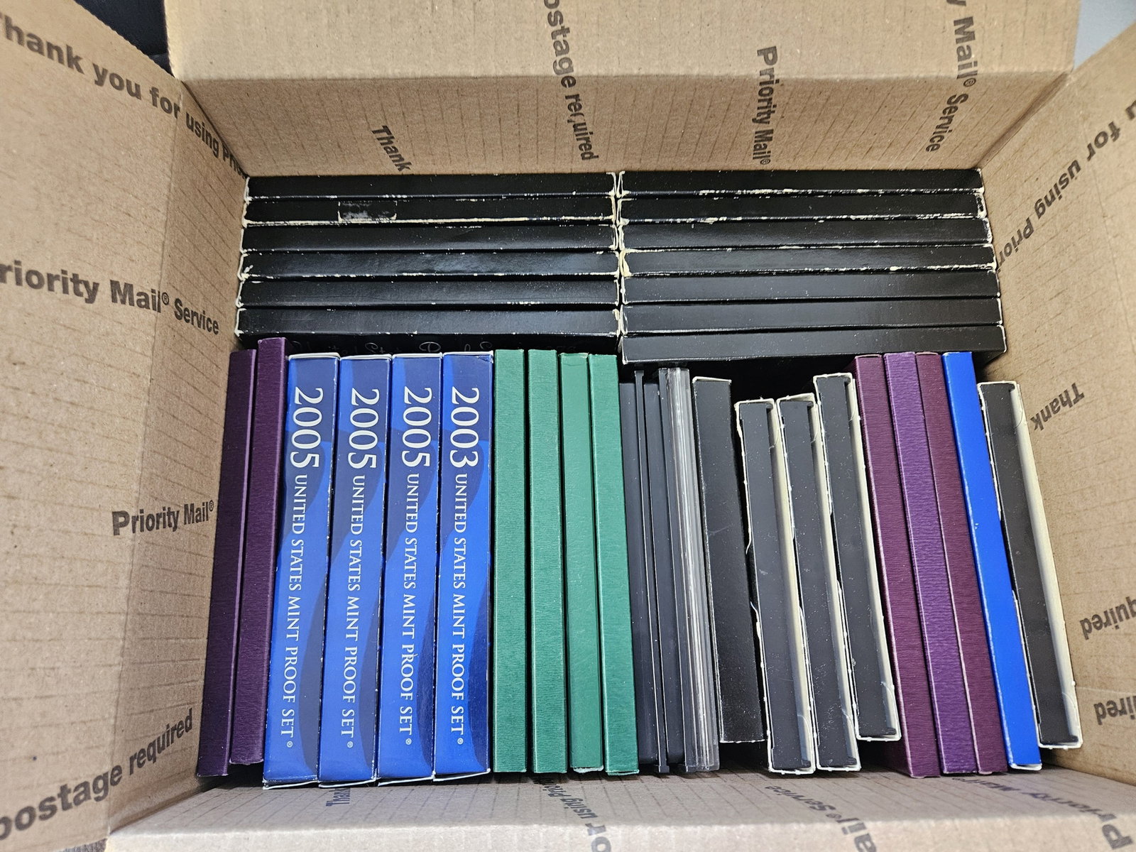 THIRTY-FIVE US Proof Sets: Ships separately in a Flat Rate Medium Box. Some Duplicates.