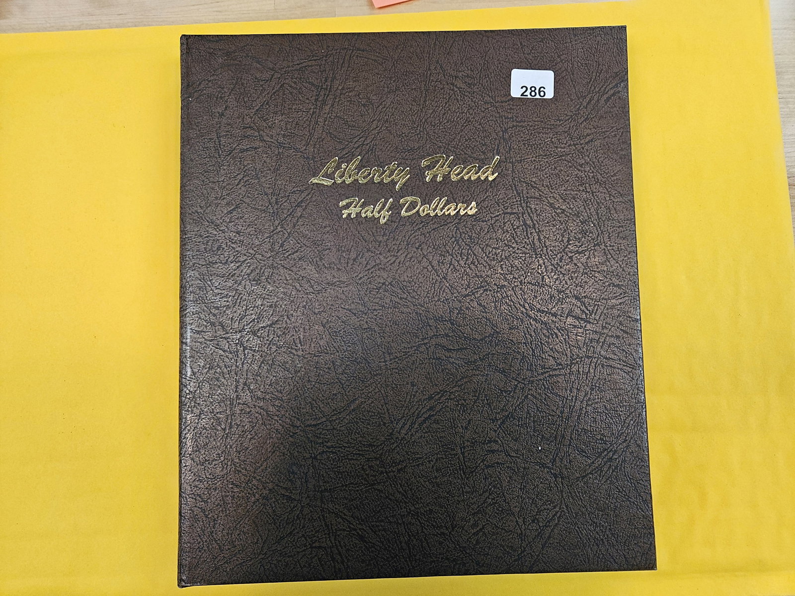 Nice Dansco album with lots of Barber silver half dollars: Total of FORTY silver Barber Half Dollars. Many that have full rims!