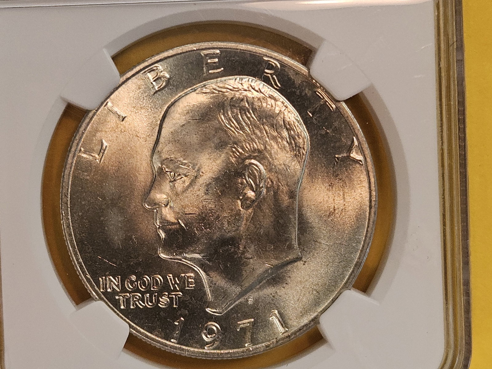 NGC 1971-S SILVER Eisenhower Dollar in Mint State 64: Near gem!