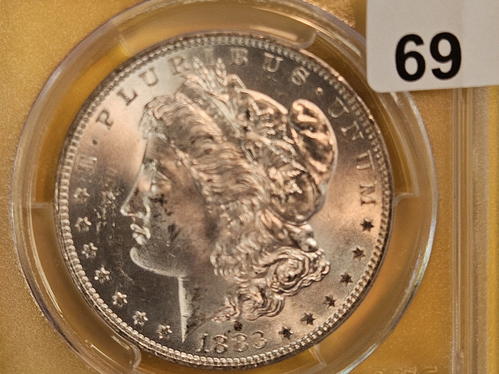 PCGS 1883-O Morgan Dollar in Mint State 63 (1 of 3)