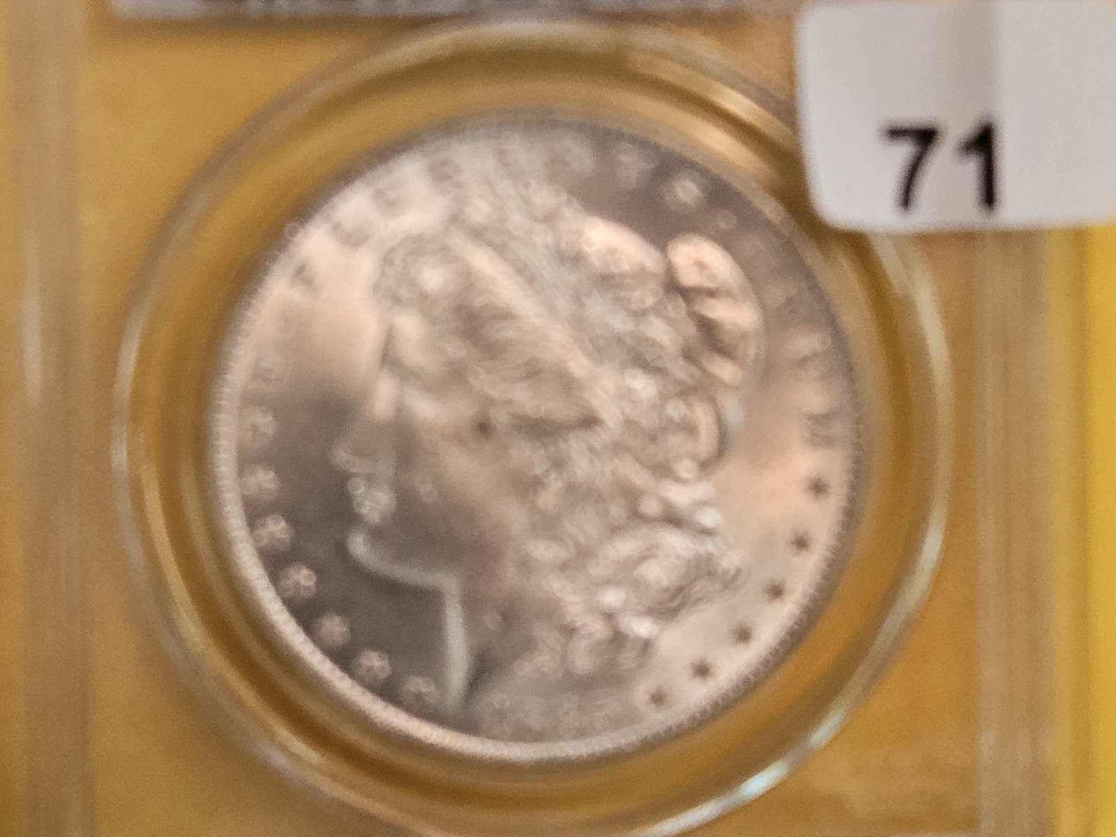 PCGS 1885-O Morgan Dollar in Mint State 63 (1 of 3)