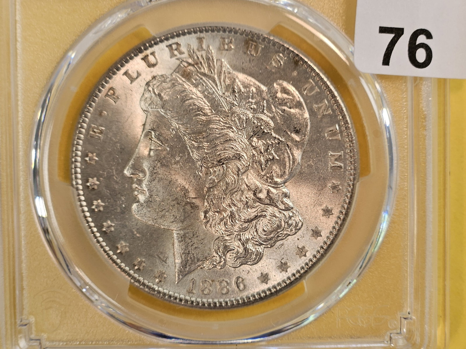 PCGS 1886 Morgan Dollar in Mint State 63 (1 of 3)