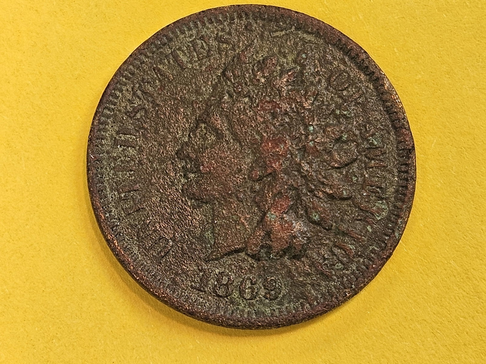 Semi-Key 1869 Indian Cent in About Uncirculated - details: Corroded