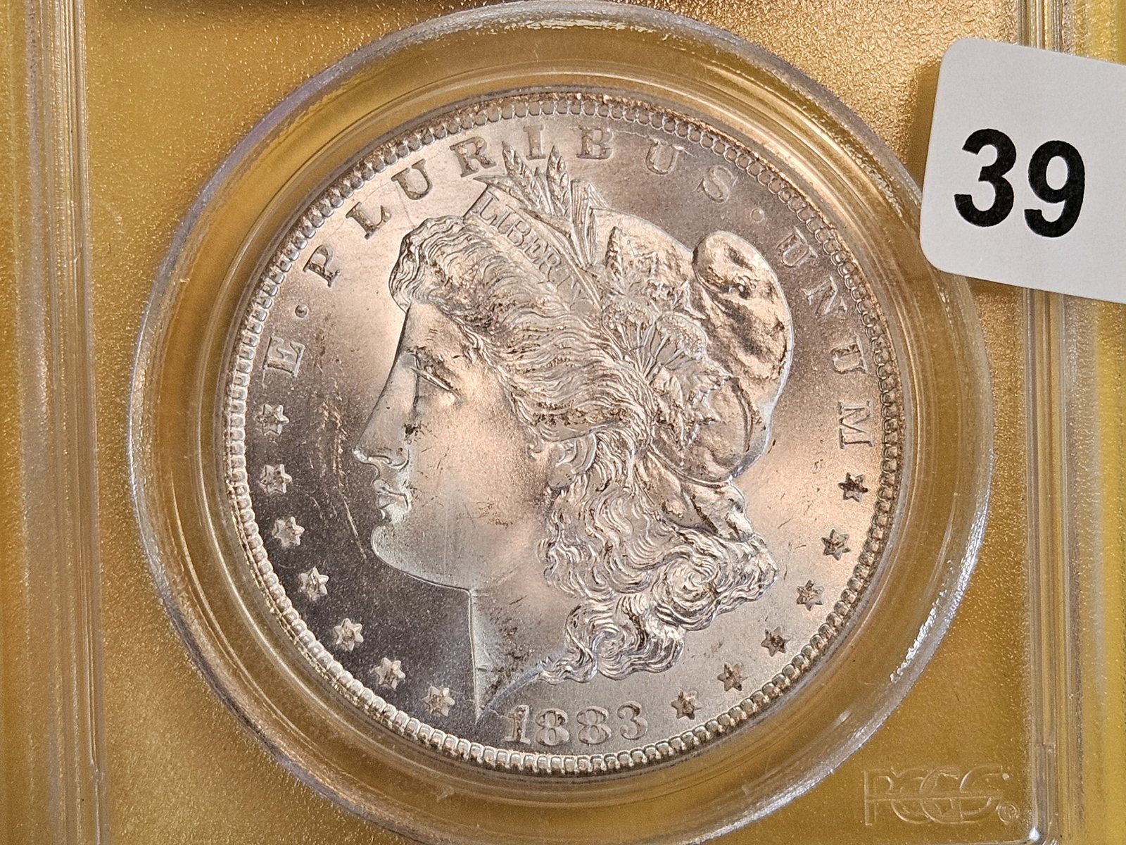 ** KEY DATE ** PCGS 1883-CC Morgan Dollar in Mint State 65 PLUS (1 of 8)