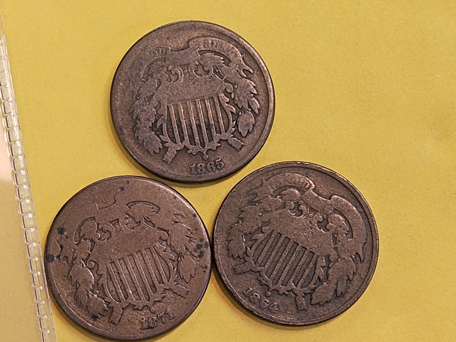 Three 2-cent pieces in Good (1 of 3)