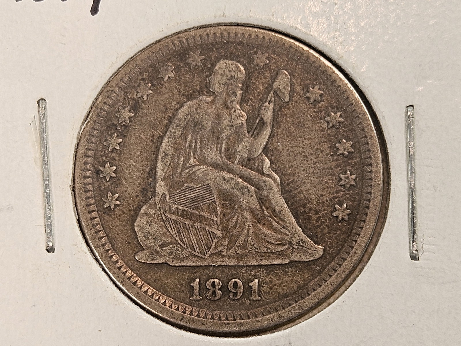1891 Seated Liberty silver Quarter in Very Fine: Nice patina