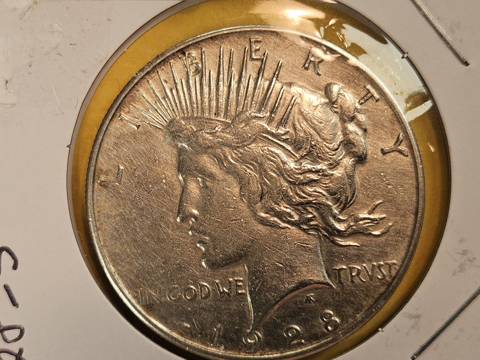 1928-S Peace silver Dollar in About Uncirculated plus: Good luster. Has a light wipe