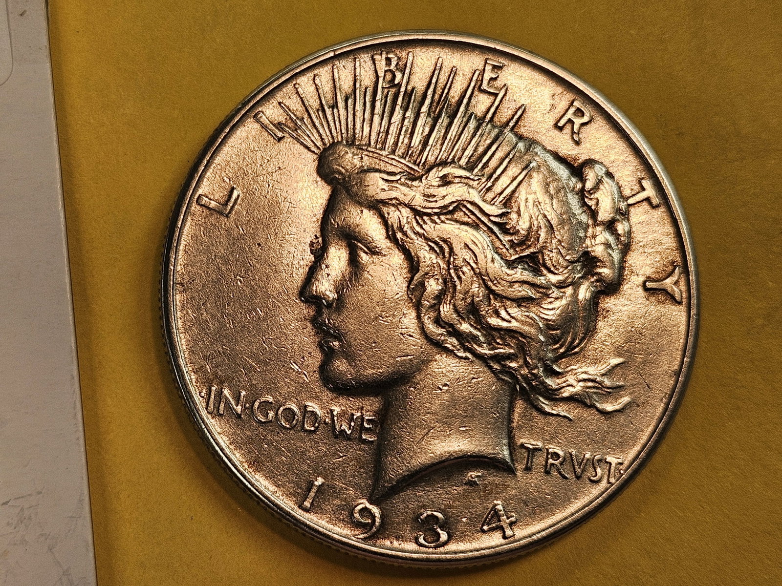 1934 Peace Silver Dollar: In About Uncirculated plus - details