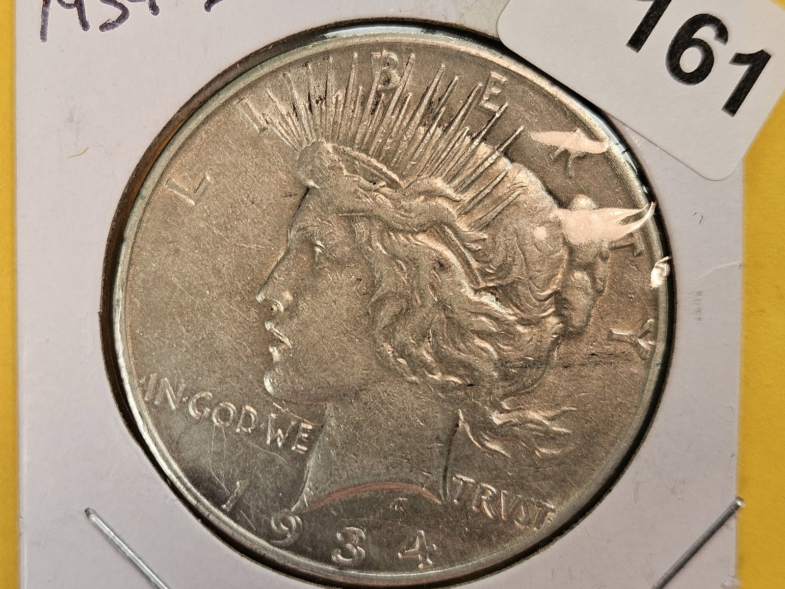 1934-D Peace Silver Dollar in About Uncirculated - details: Light surface issues