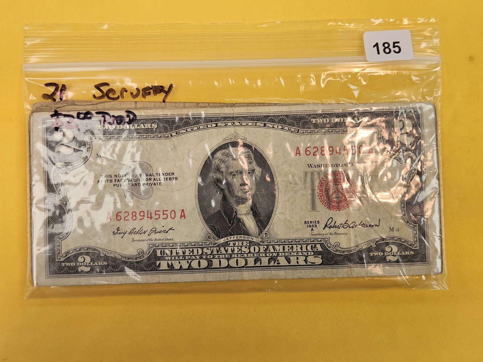 Twenty-One $2 US notes: All kinda scruffy