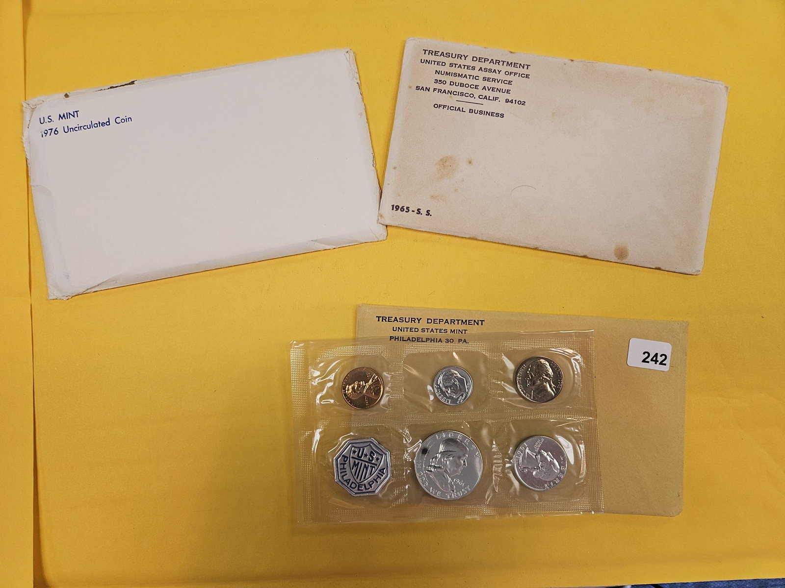 Three US Sets in OGP: 1976 Mint, 1965 Special Mint Set and 1961 Silver proof Set