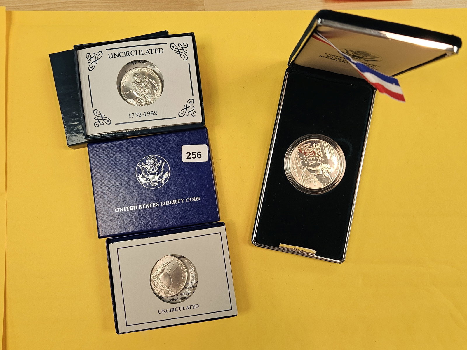 Three more Commemorative US Coins: Silver Half, clad half, Silver Dollar
