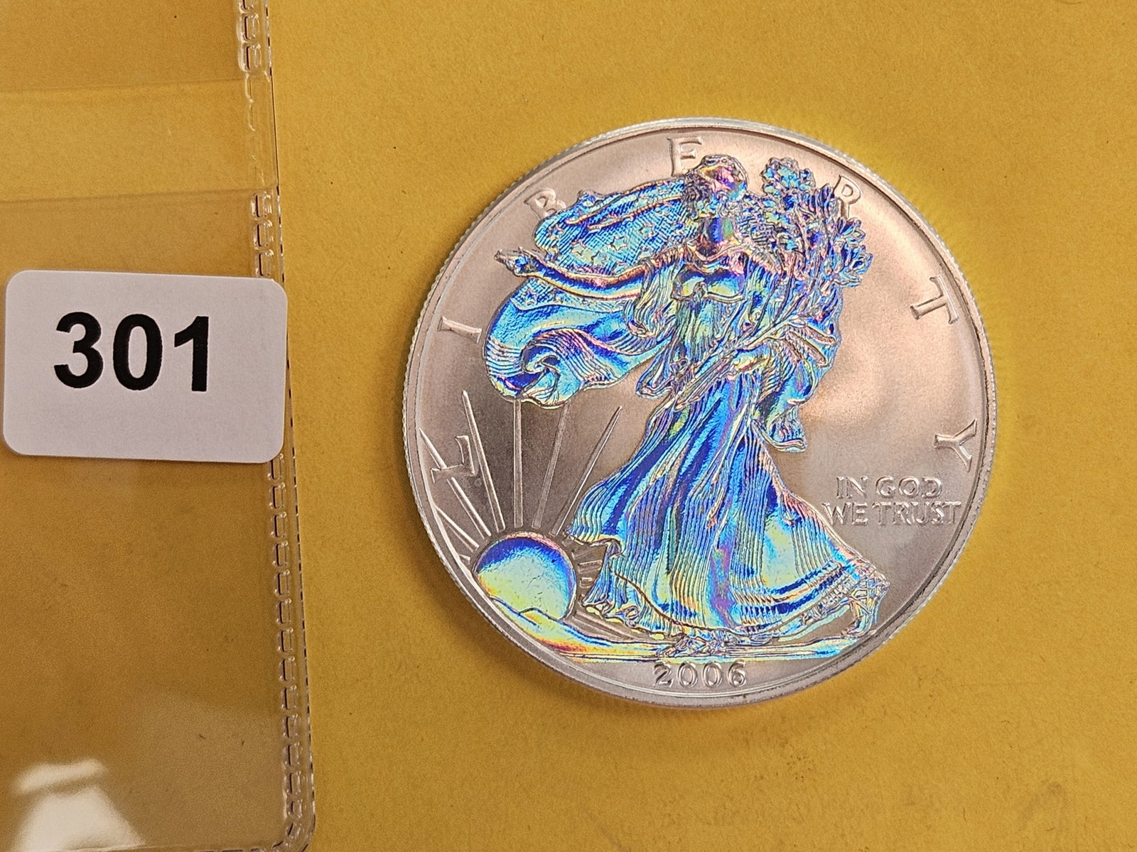 And last, but not least, a GEM BU 2006 ASE: Holographic. Thanks all for another great auction! Have a lovely night, wonderful week, and we'll see ya'll again next time!