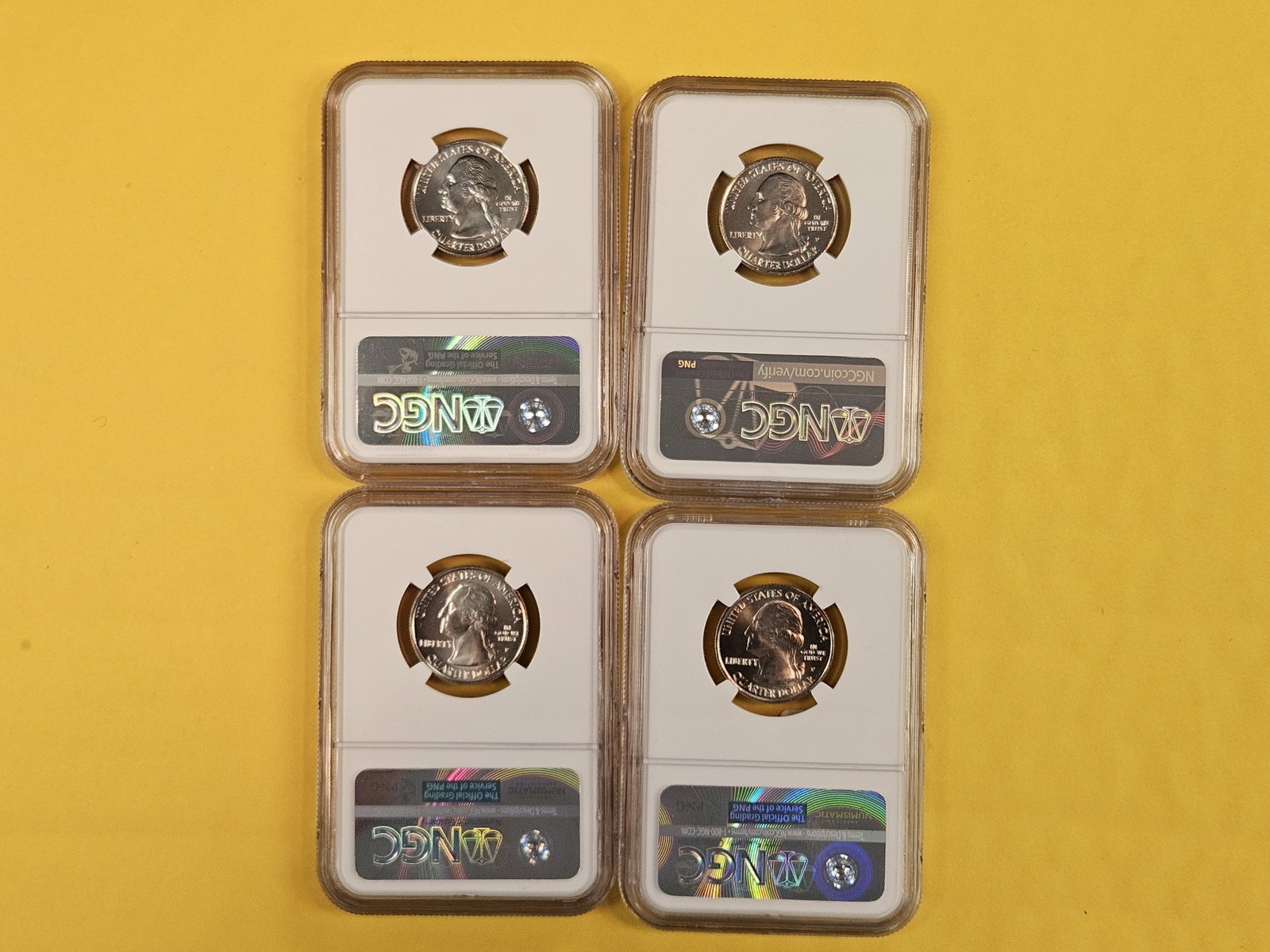 Four Superb GEM NGC-graded Washington Quarters - 2
