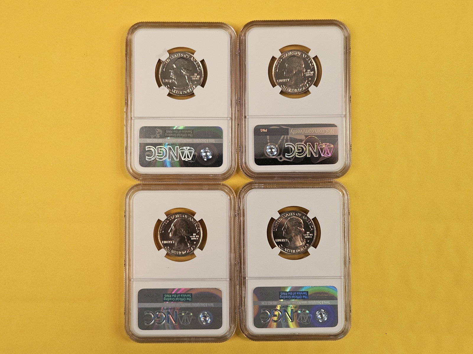 Four Superb GEM NGC-graded Washington Quarters - 2