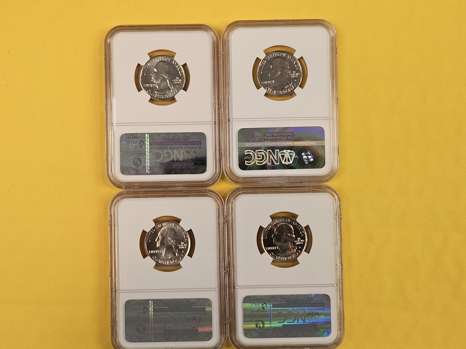 Four GEM to Superb GEM NGC-graded Washington Quarters - 2