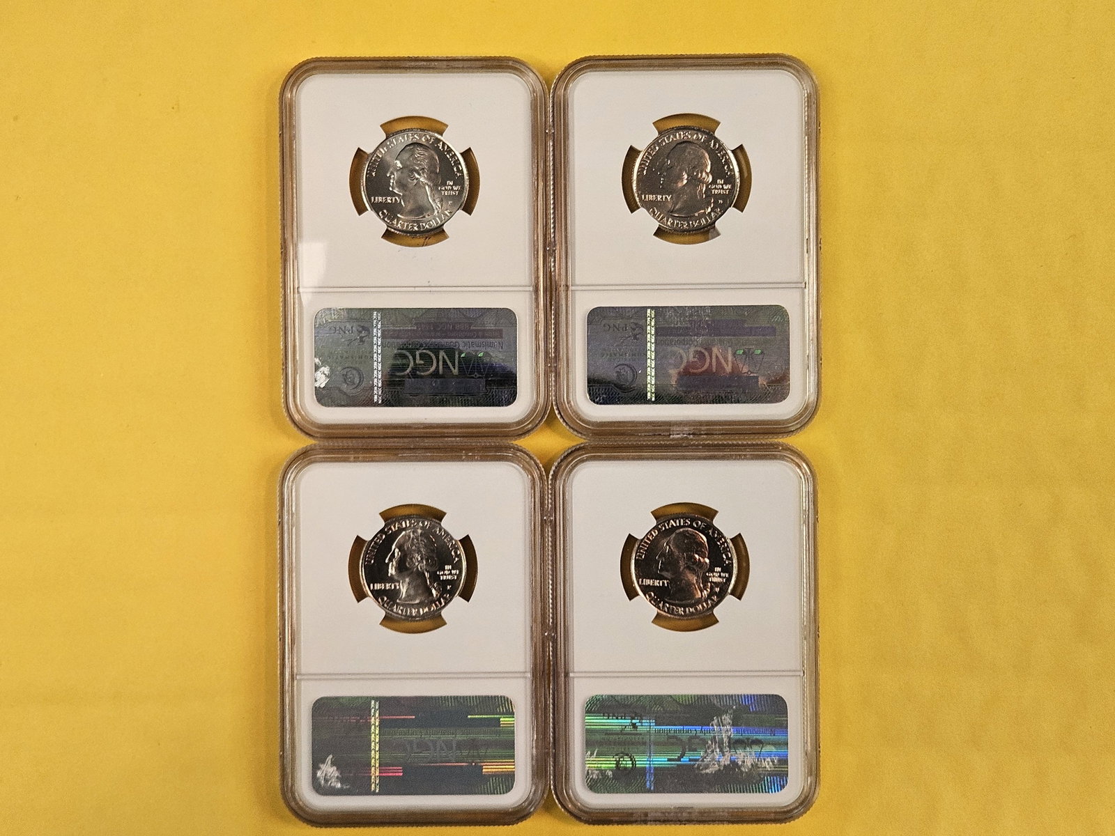 Four GEM NGC-graded Washington Quarters - 2