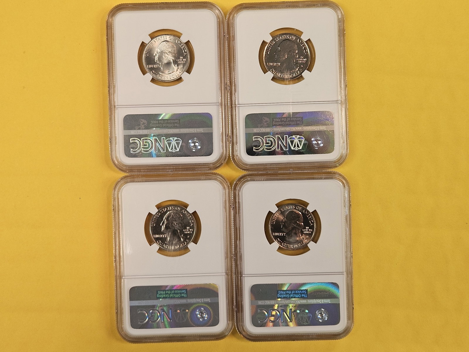 Four GEM to Superb GEM NGC-graded Washington Quarters - 2
