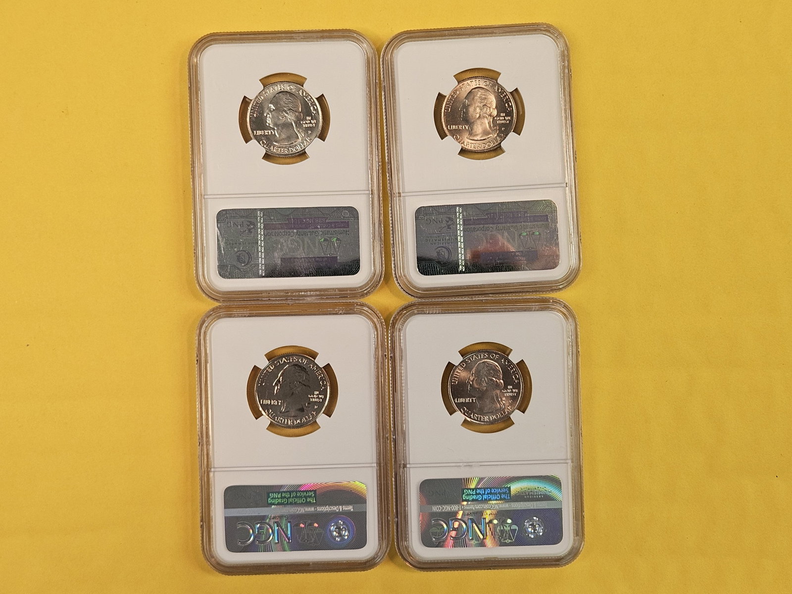 Four GEM to Superb GEM NGC-graded Washington Quarters - 2