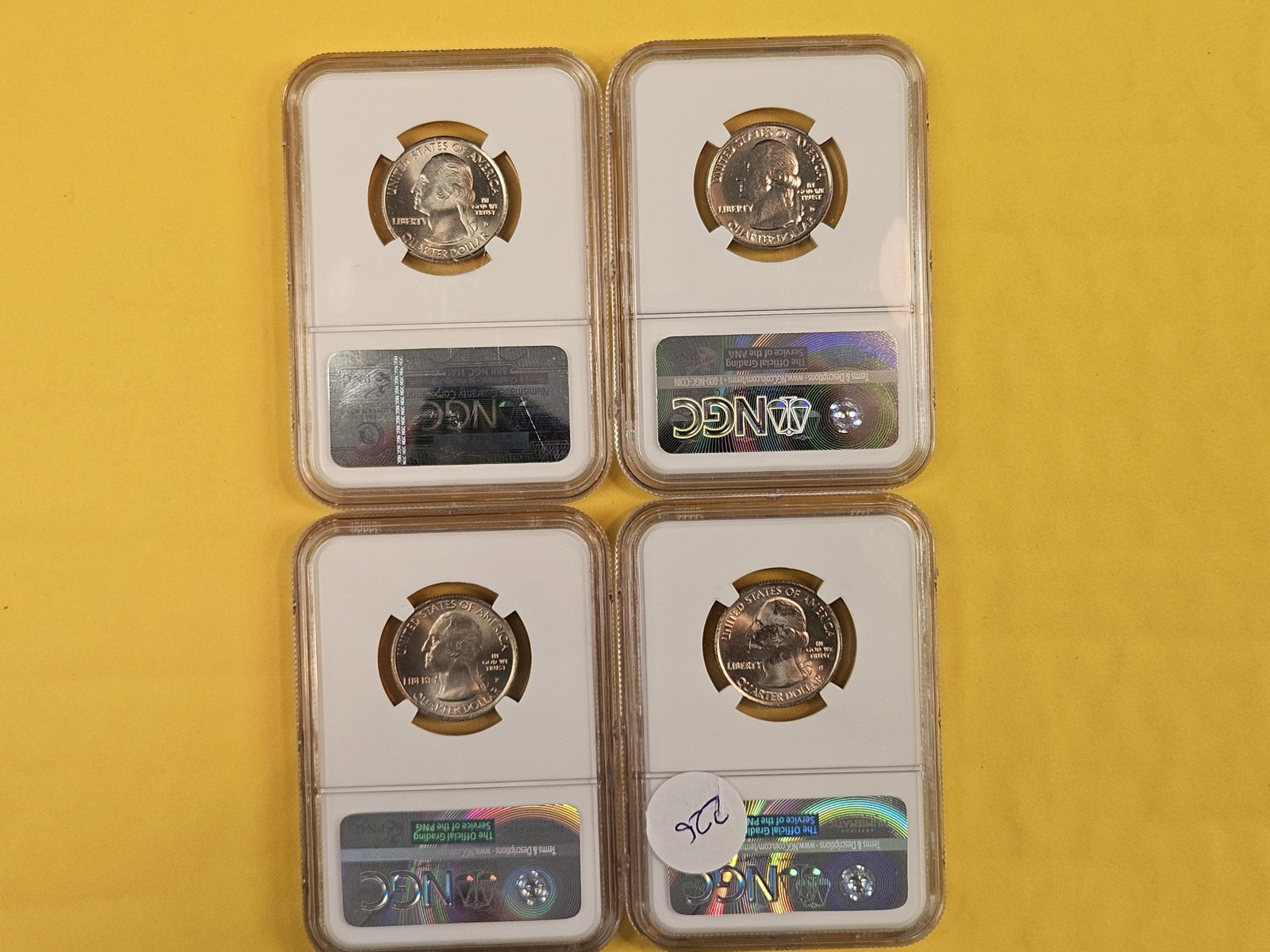 Four GEM to Superb GEM NGC-graded Washington Quarters - 2