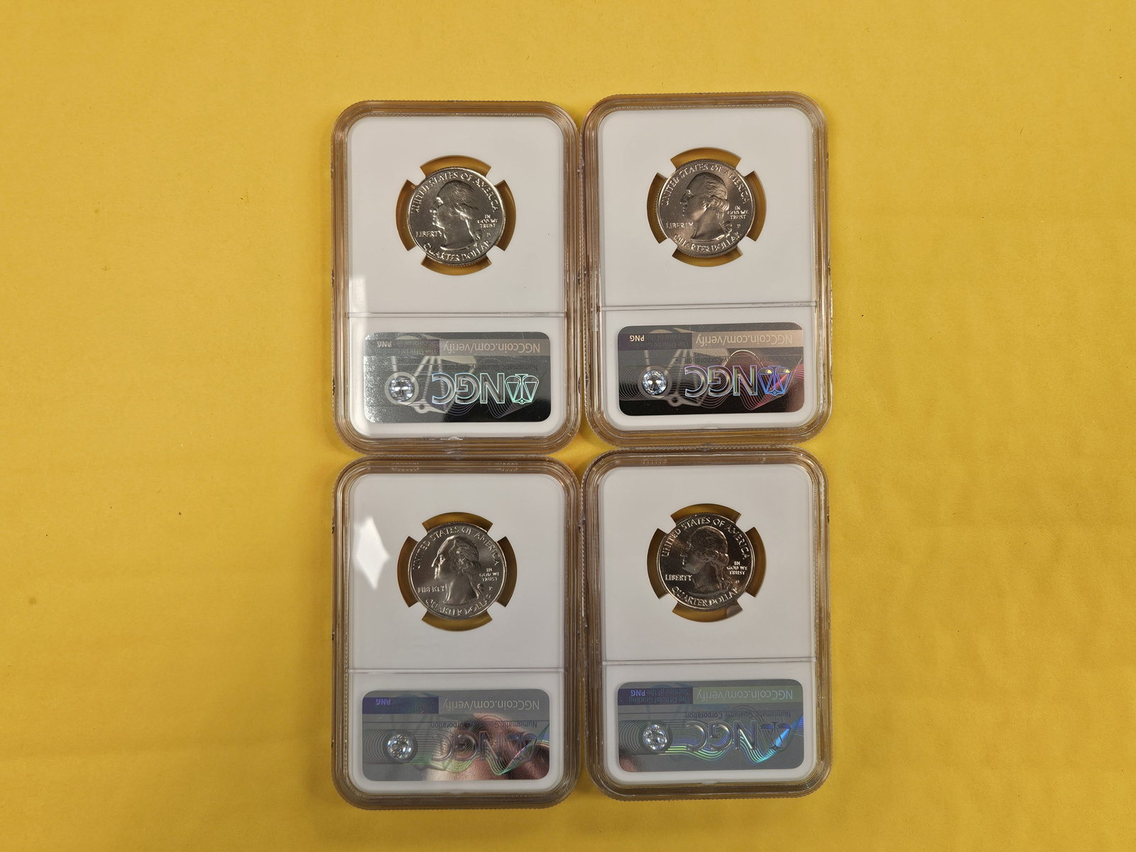 Four Superb GEM NGC-graded Washington Quarters - 2