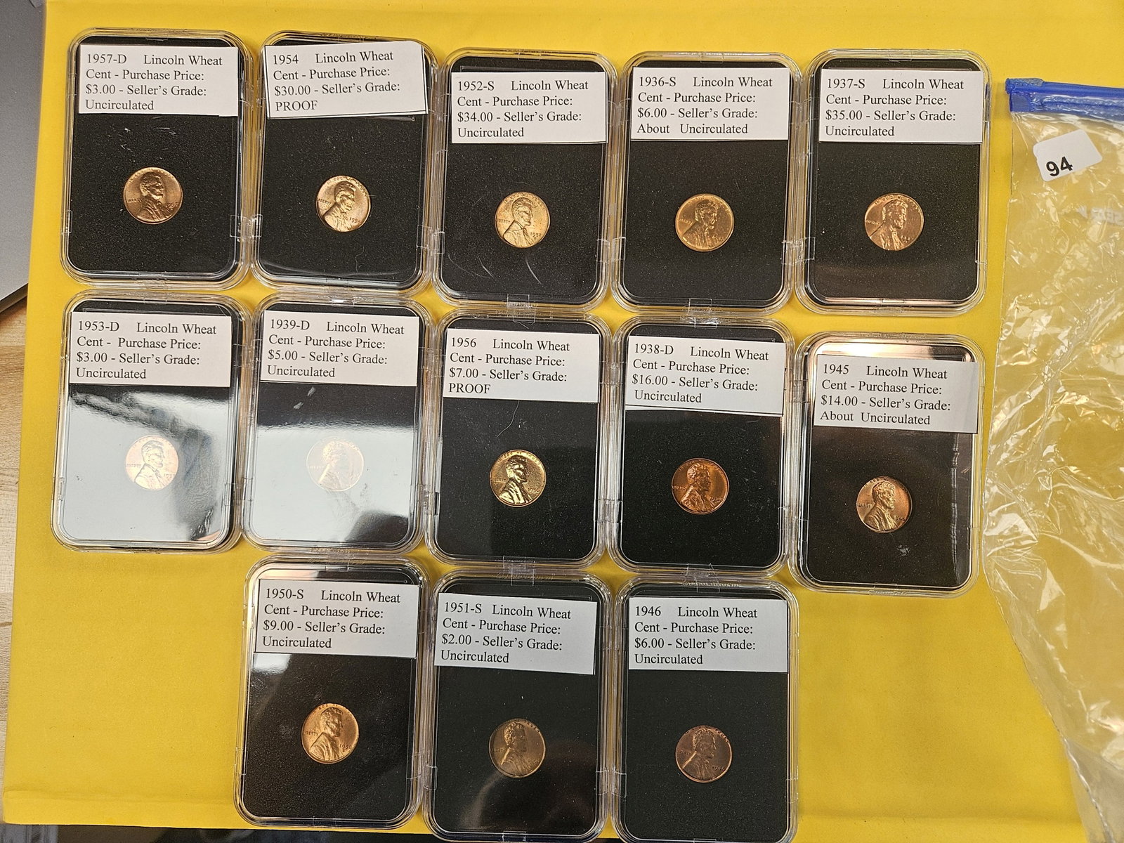 Thirteen Uncirculated or Proof Wheat cents: All in off-brand slab holders