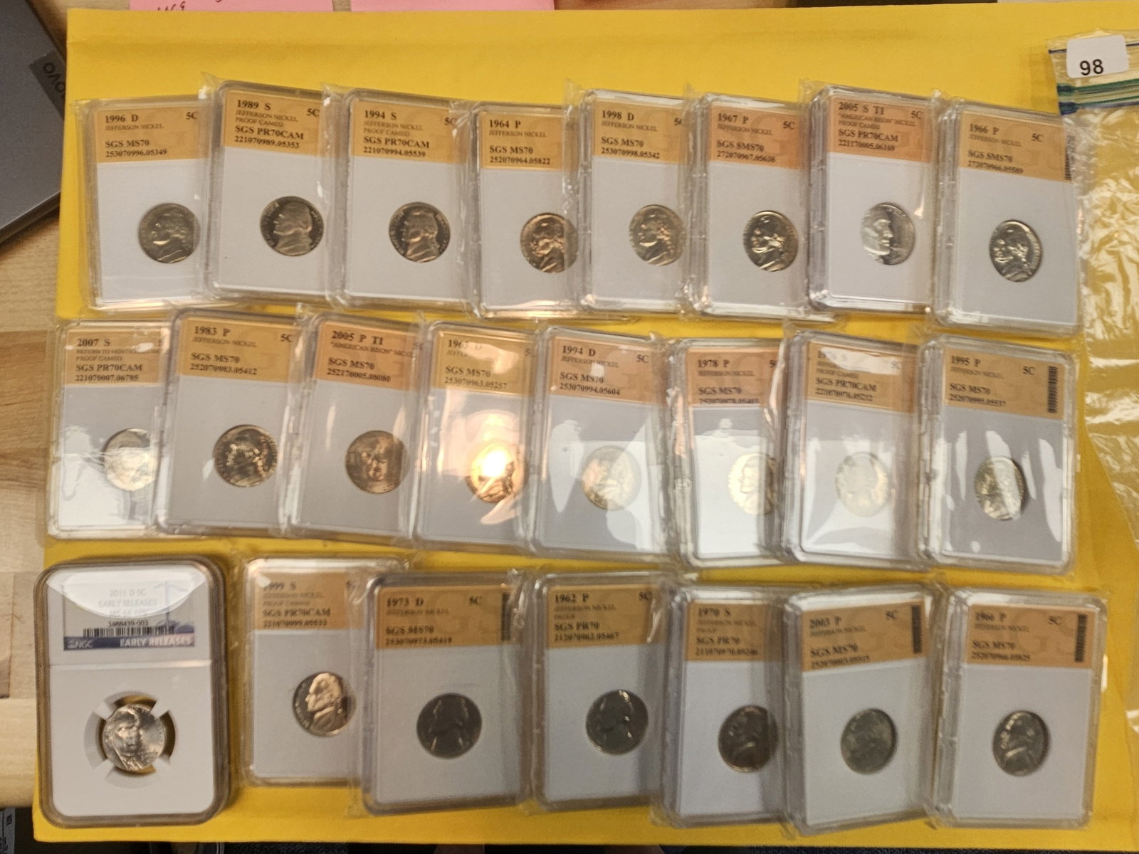 Twenty-three mixed Jefferson nickels: Nice! All in off-brand slabs
